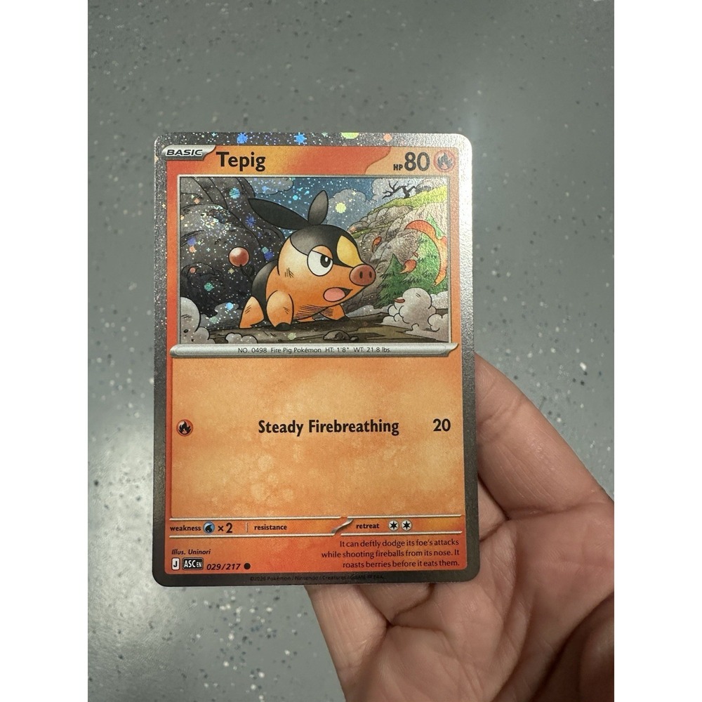 Tepig (Cosmos Holo) 029/217 FART SWIRL 🌀 Cards Holo Near Mint